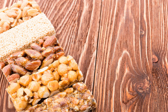 Peanut brittle sweet hard on wooden table