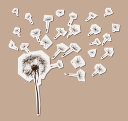 silhouette of dandelion in the wind