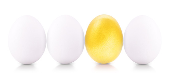 Success Symbol Concept with gold and white eggs