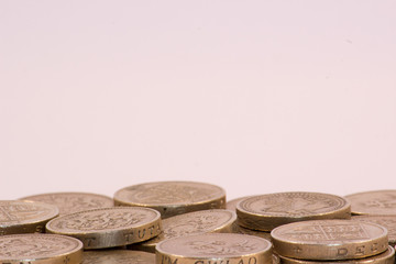 UK Pound Coins on white background