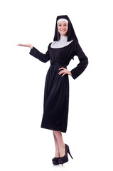 Cheerful posing nun holding isolated on white