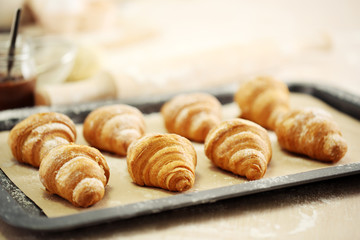 Baking croissant cookies.