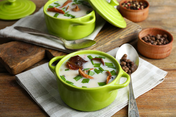 Mushroom soup on wooden background