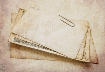 Vintage paper card on wooden texture