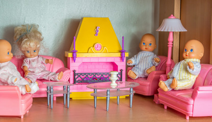 small doll living room with kewpie dolls