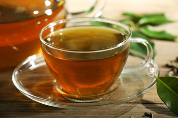 Cup of green tea on table close-up