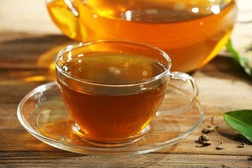Cup of green tea on table close-up