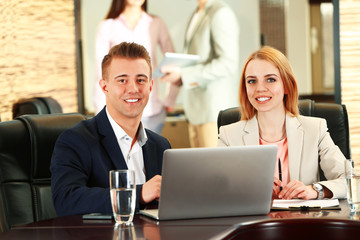 Business people working in conference room