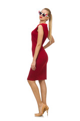 Pretty young woman in red dress isolated on white