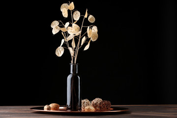 Composition of dried flower on dark background