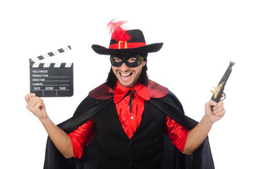 Young man in carnival coat with gun and clapper isolated on whit