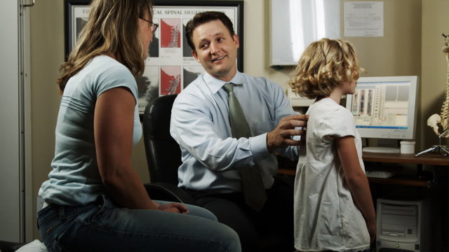 mother and daughter at the chiropractor