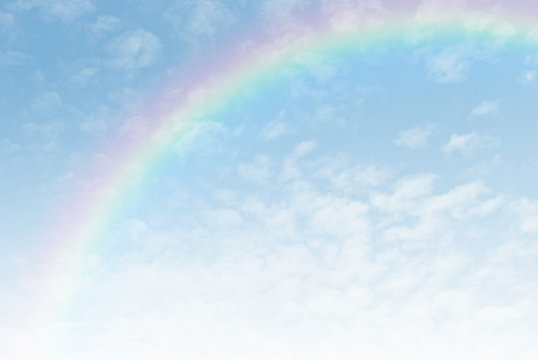 rainbow in the blue sky after the rain
