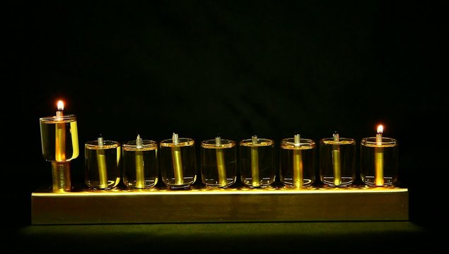 1 flame in Hanukia made of olive oil lanterns