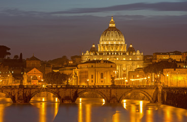 Fototapeta na wymiar Rome - Angels bridge and St. Peters basilica in evening dusk