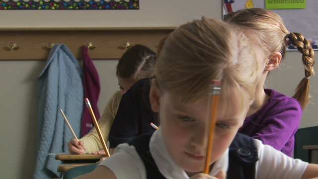 boy cheating in class