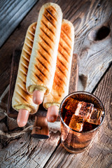 Three hot dog with cold drink