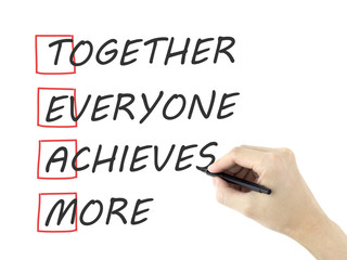 Together Everyone Achieves More written by man's hand