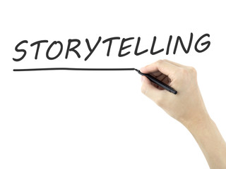 storytelling word written by man's hand