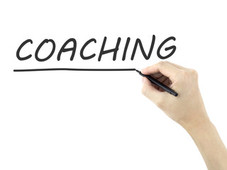 coaching word written by man's hand