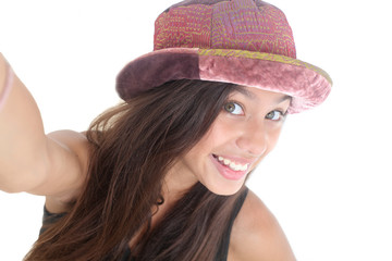 happy teen girl taking a self portrait on white background