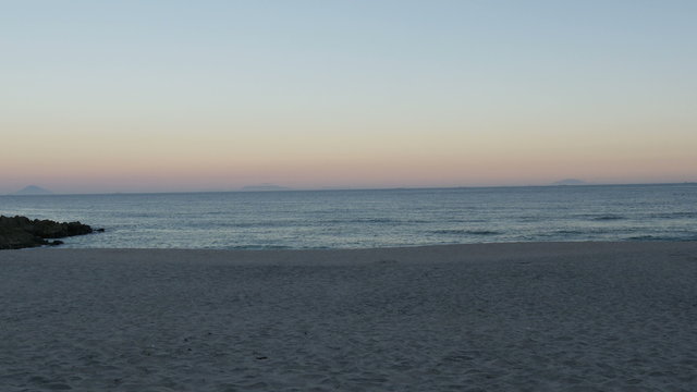 Sunset over Ohama beach in Shimoda.