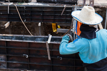  The worker is constructing underground floor of the building