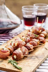 Zelfklevend Fotobehang stuffed dates with bacon © Maksim Shebeko