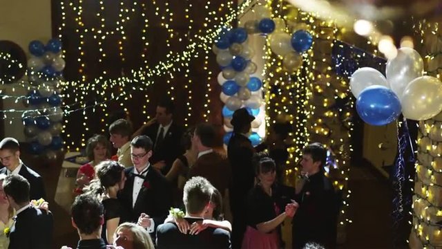 MS CS R/F Couples dancing on prom night under disco ball / Cedar Hills, Utah, USA