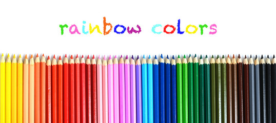 Obraz premium Set of multicolored wooden pencils with copy space on white