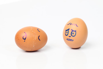 Sad Easter egg with broken one near by