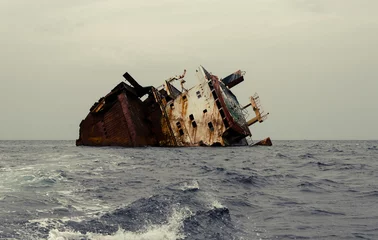 Wall murals Shipwreck Shipwreck, rusty ship wreck