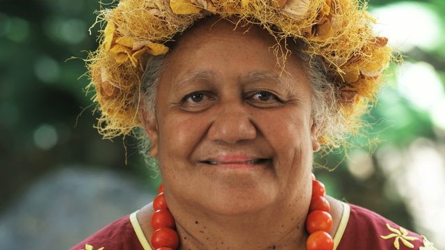 pacific islander woman looking at camera