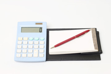 Photo of the Business concept with calculator, pen and notebook