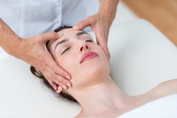 Fototapeta na wymiar Physiotherapist doing head massage