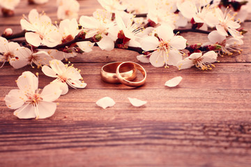 Wedding rings. Bridal bouquet of white flowers
