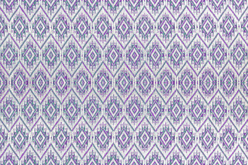 Colorful thai handcraft peruvian style rug surface close up. Mor