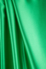 Green silk background.