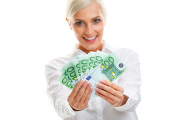happy young woman holding euro bills