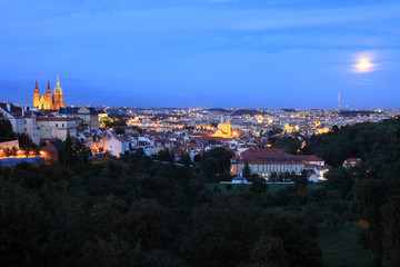 Evening Prague with gothic Castle and Moon, Czech republic