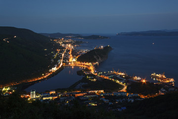 Fototapeta na wymiar Night view of Petropavlovsk-Kamchatsky City and Avacha Bay