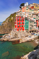 Fototapeta na wymiar Riomaggiore town on the coast of Ligurian Sea, Italy