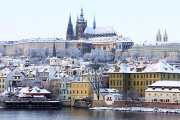 Snowy Prague gothic Castle above River Vltava