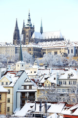 Snowy Prague gothic Castle above River Vltava