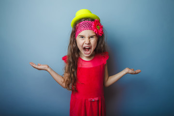 Girl European appearance haired child of seven years in a bright