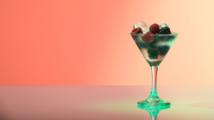 Raspberry and blackberry cocktail with ice, studio shot