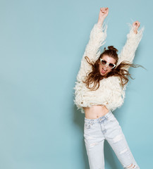 portrait of cheerful fashion hipster girl going crazy making - 82468170