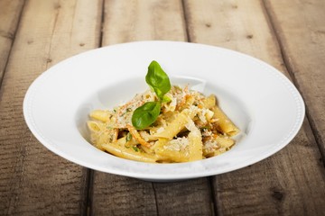 Basil. Pasta. Penne Pasta with Bolognese Sauce, Parmesan Cheese