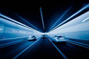 speeding car through tunnel - obrazy, fototapety, plakaty