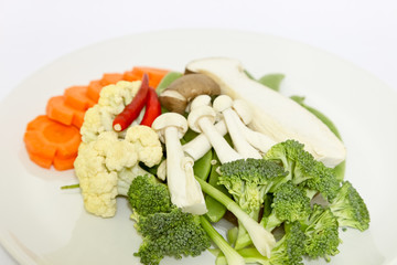 mix colorful vegetables and herb on white background